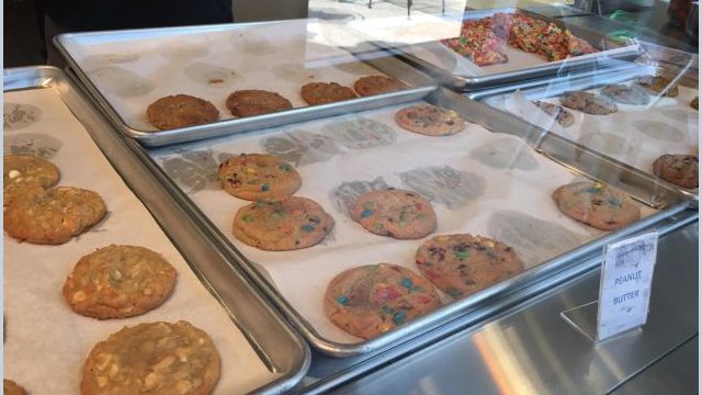 Customers can choose the many cookie flavors on display.