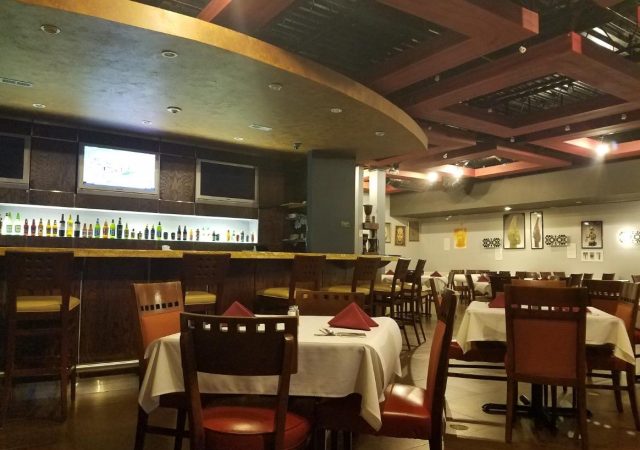 The restaurant's atmosphere was friendly and there was interesting art on the walls