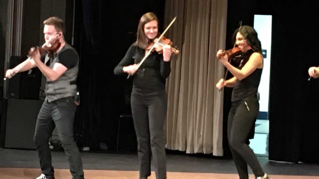 Orchestra teacher Heather Lofdahl plays with Barrage 8.