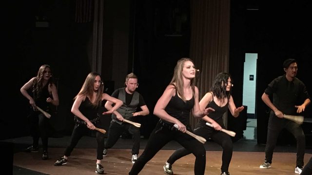 Barrage 8 performs a song using wooden spoons which is an Irish tradition.