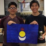 Matthew Jun and Michael Lee with the Mongolia flag and their first place trophies.