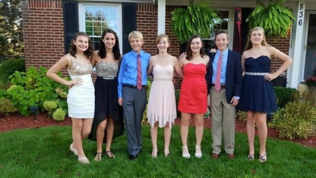 Graham and friends pose for homecoming pictures.