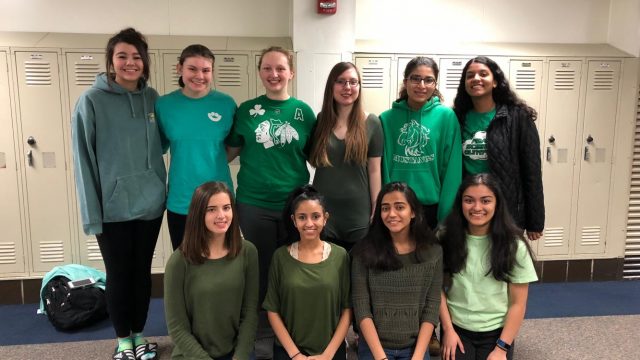 Graham’s peers wear green in memory of him.