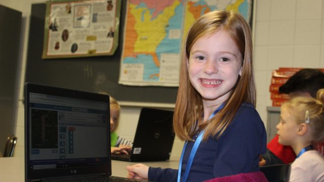 Student excited about working with block style coding.