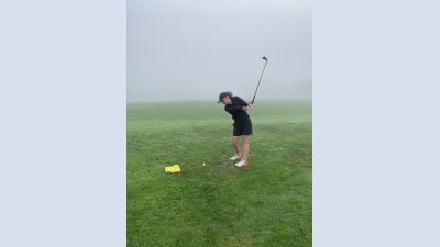 Sadie Zorrilla, ‘23, takes a swing at the state competition in Decatur. Photo courtesy of Sadie Zorrilla.