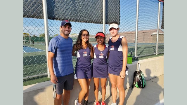 Coach Matthew Marks, Riya Jain, ’22, Nirali Patel, ’22, and Kaitlyn Strilich, '25, (left to right) at the MSL Championship. Photo courtesy of Matthew Marks.